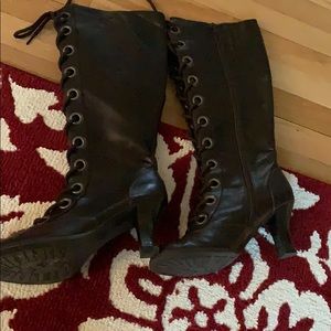 Tall brown lace-up boots